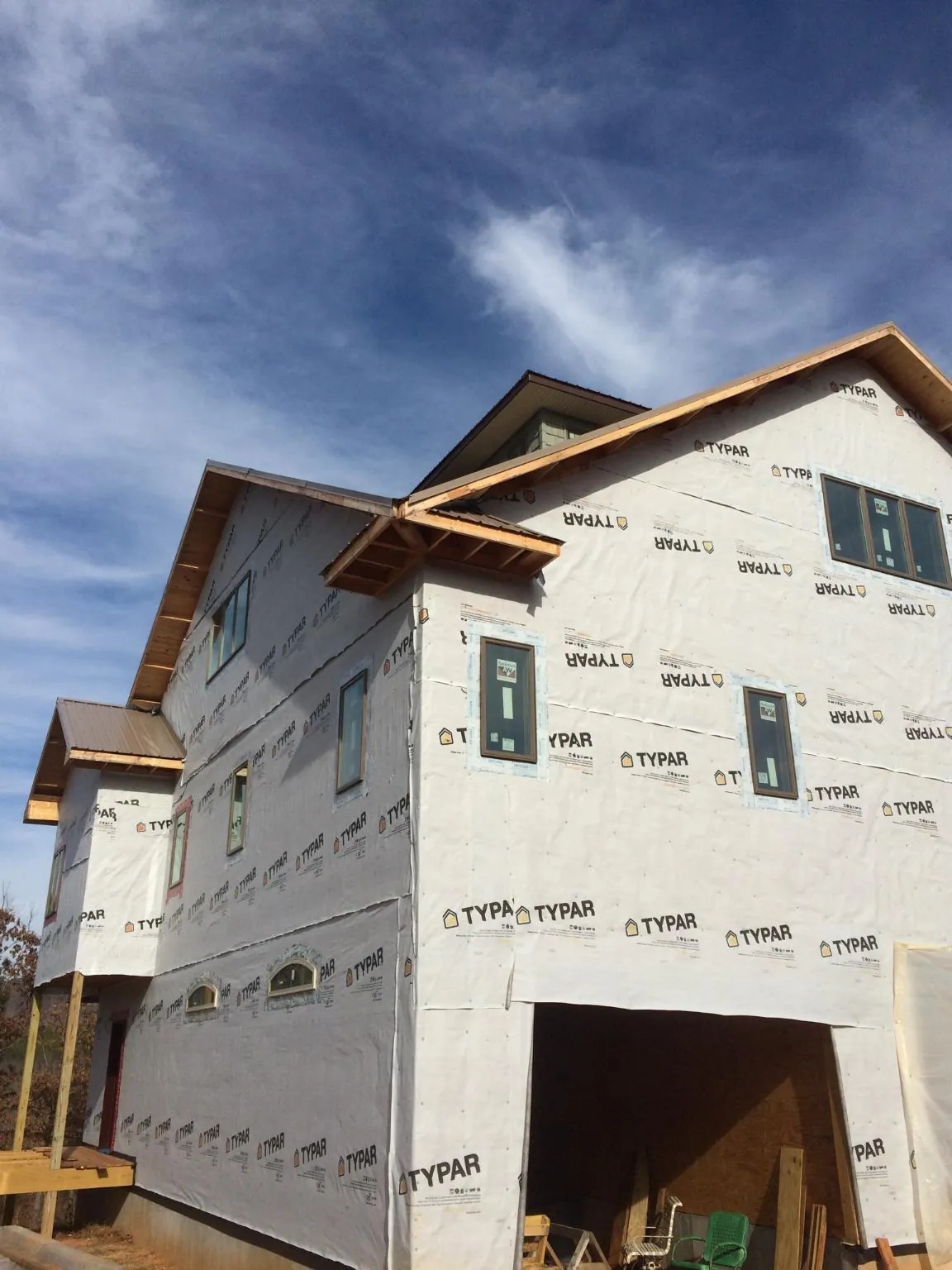 Stick built house wrapped in Typar with new roof framing and dormers in York